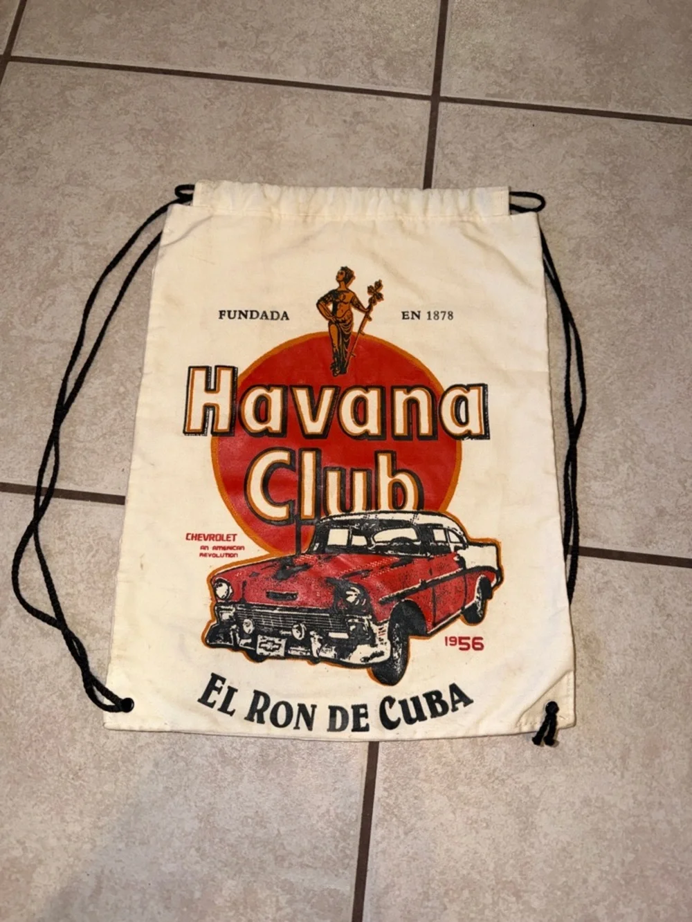 Cream Drawstring Backpack with Red Graphic